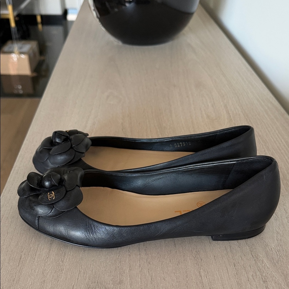 CHANEL Black CAMELLIA Flats with Floral Detail